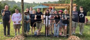 Sea Wind community members gather at the farm.